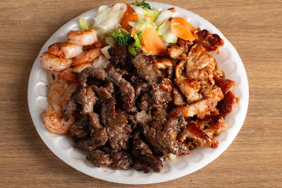 Grilled chicken, beef and shrimp teriyaki with rice and veggies at Suki Hana, a Japanese Restaurant in Valencia