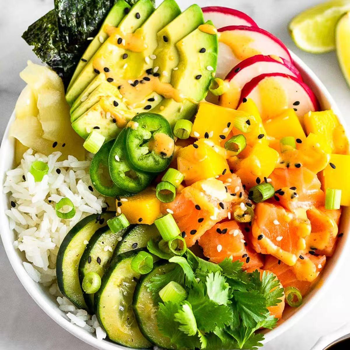 Spicy Salmon Poke Bowl - Rice bowl with salmon, avocado, mango, and sesame at Super Bowl, an Asian - Fusion restaurant in Fort Worth