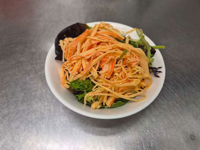 Shredded imitation crab salad served over mixed fresh leafy greens at Sushi & Grill, a Asian Restaurant in Elkton