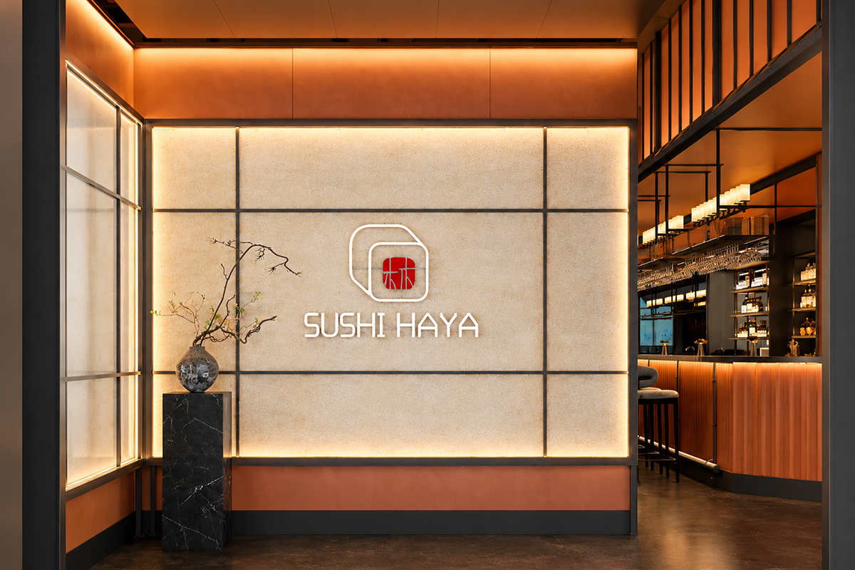 Illuminated Sushi Haya entrance wall at Sushi Haya, a Japanese Restaurant in Baytown