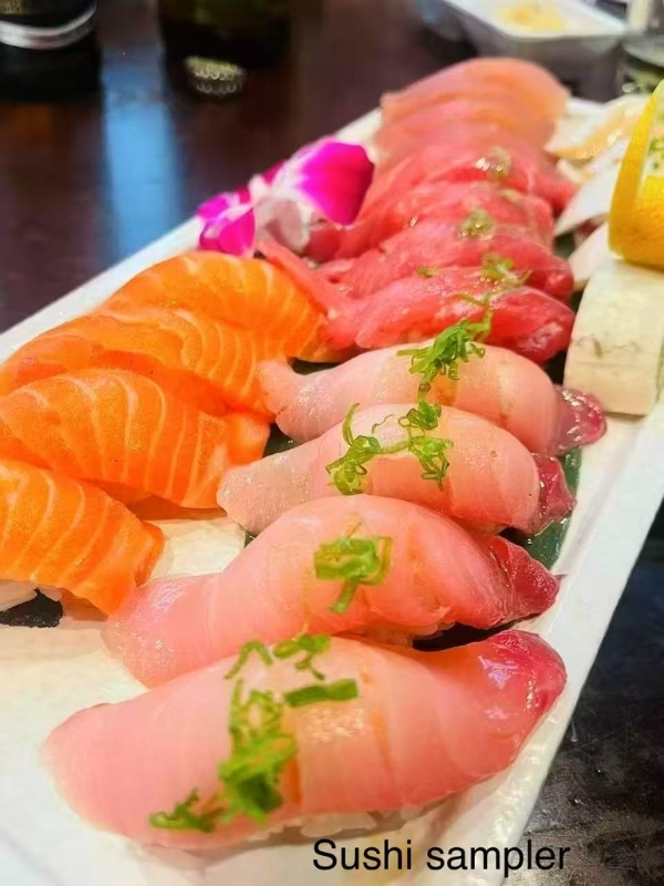 Sushi-King-&-Grill-Japanese-Restaurant-Sushi-Sampler-Corona Assorted sushi pieces with fresh toppings at Sushi King & Grill, a Japanese Restaurant in Corona.