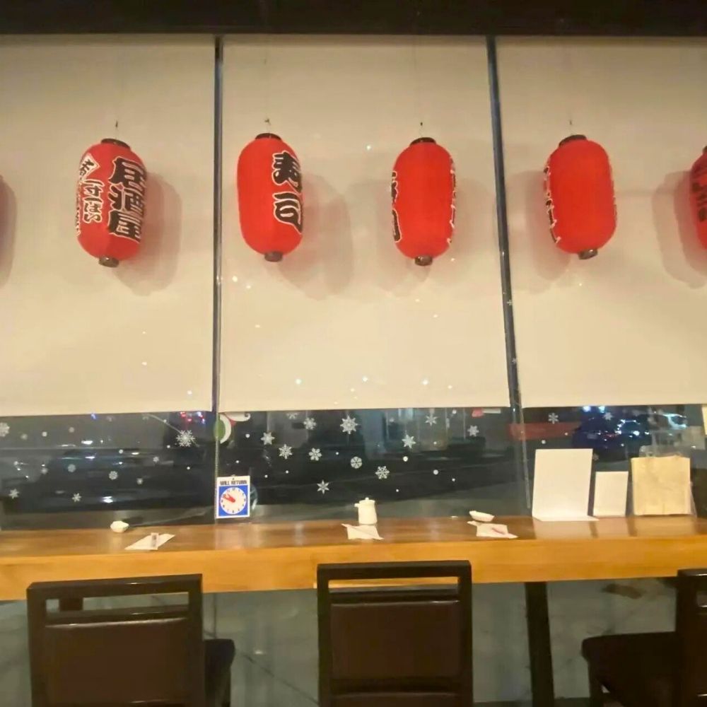 Interior wall decorated with red Japanese lanterns at Sushi of Miso, a Japanese Restaurant in Long Island City.