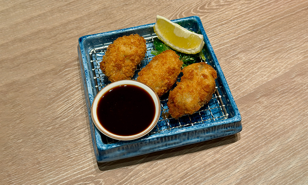 Crispy fried oysters with dip at Sushi Umami, a Japanese Restaurant in Milpitas
