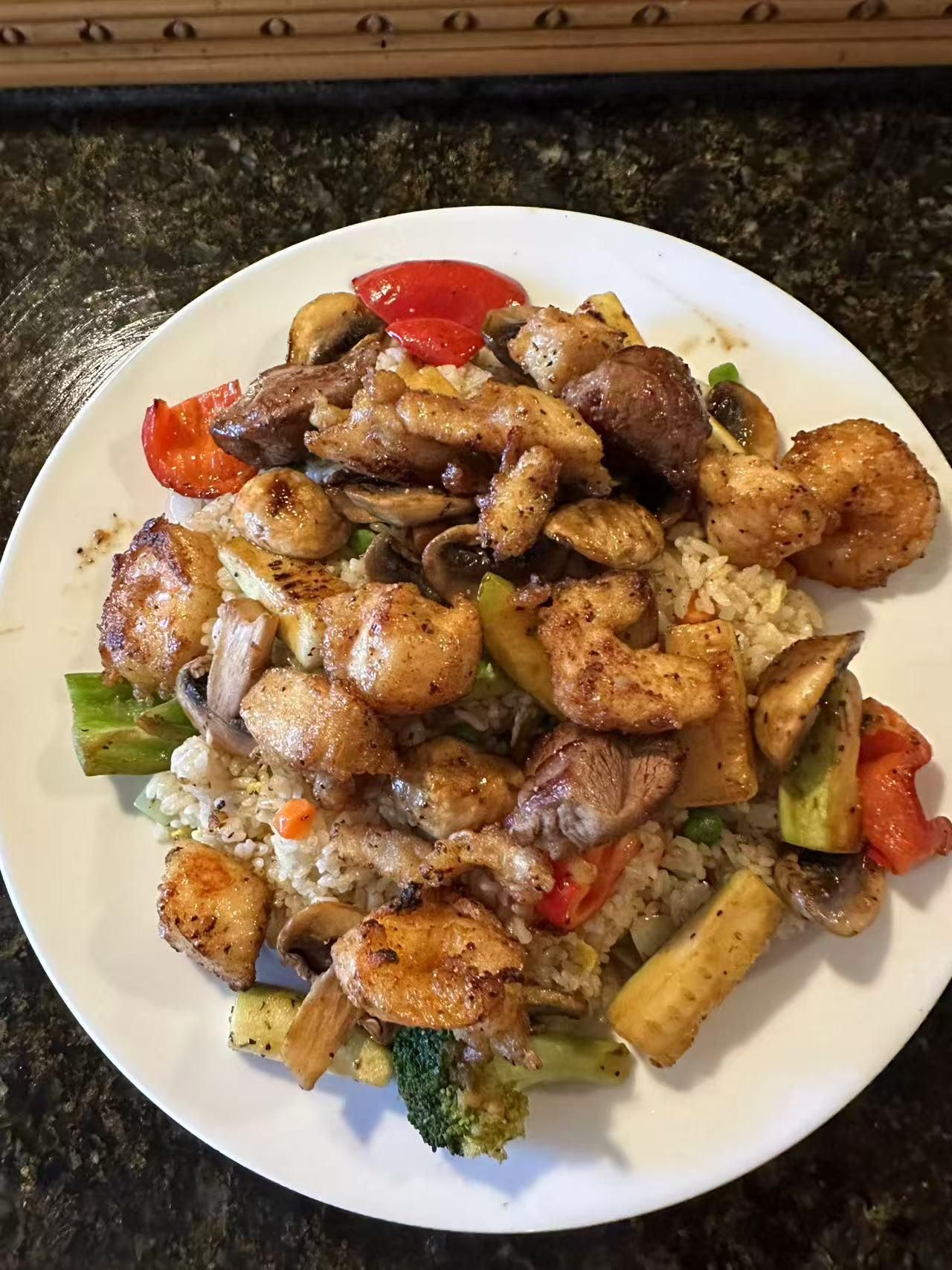 Hibachi house rice with grilled vegetables from Sushi Wok, a Japanese restaurant in Jacksonville