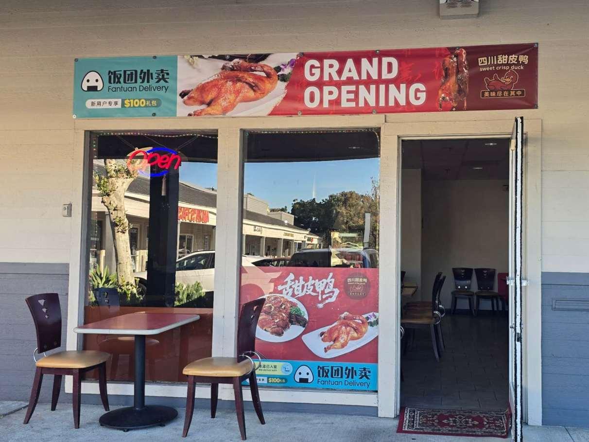 Storefront of Sweet Crisp Duck with grand opening banner at Sweet Crisp Duck, a Chinese Restaurant in Newark