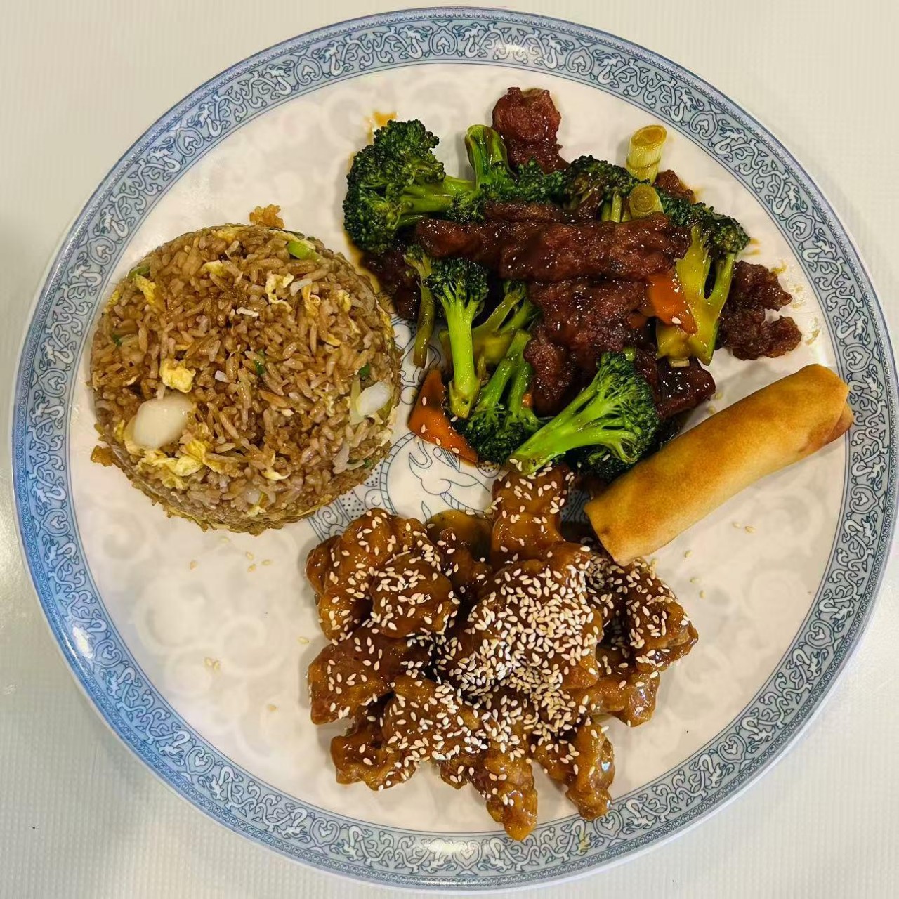 B combo with beef, sesame chicken and egg roll at Szechuan Impression, a Chinese Restaurant in Federal Way