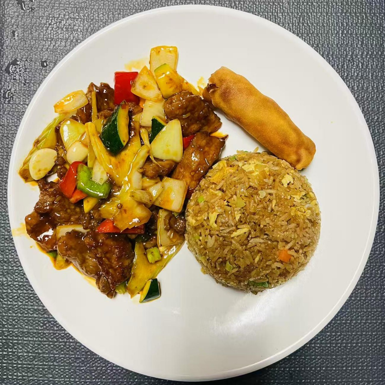 Lunch combo with Sichuan beef, fried rice and egg roll at Szechuan Impression, a Chinese Restaurant in Federal Way