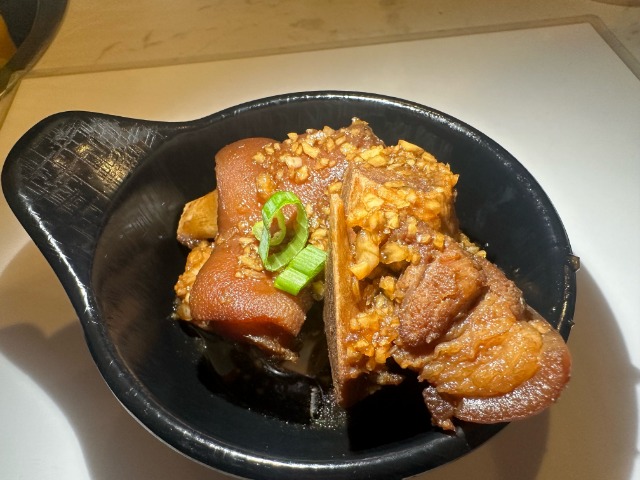 Braised Pig Feet - Tender braised pig feet with garlic and scallion topping at T-Pot & BBQ, a Asian Fusion Restaurant in College Park