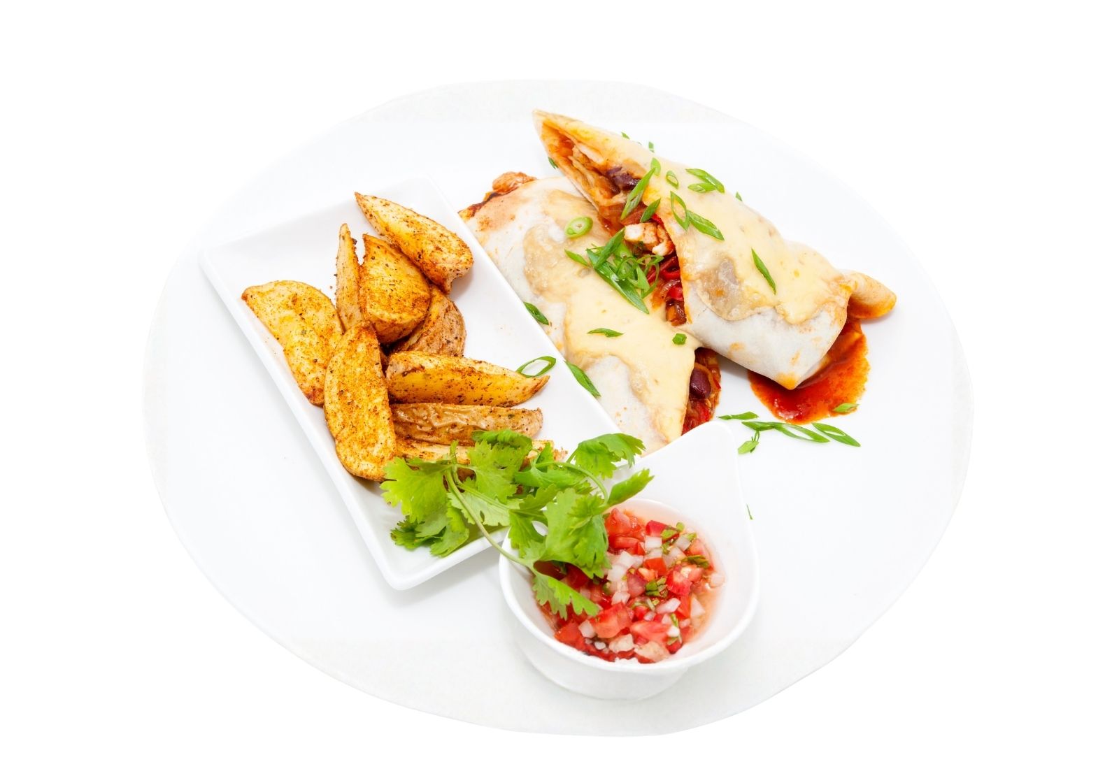 Beef chimichanga with potato wedges and salsa at Taco Vida, a Mexican Restaurant in New York