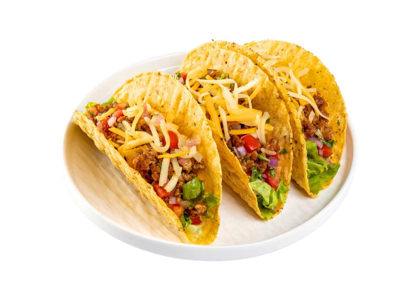 Crispy beef tacos with lettuce, cheese and salsa at Taco Vida, a Mexican Restaurant in New York