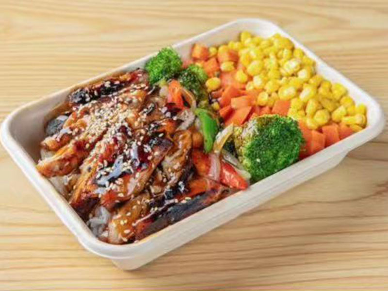 White lunch tray with teriyaki glazed eel fillet, broccoli, diced carrots and sweet corn side at Takuma Hibachi , a Japanese Restaurant in Hillsboro