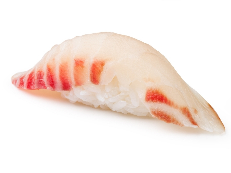 White fish nigiri sushi sits atop vinegared rice at Takumi Sushi, a Sushi Restaurant in Seattle