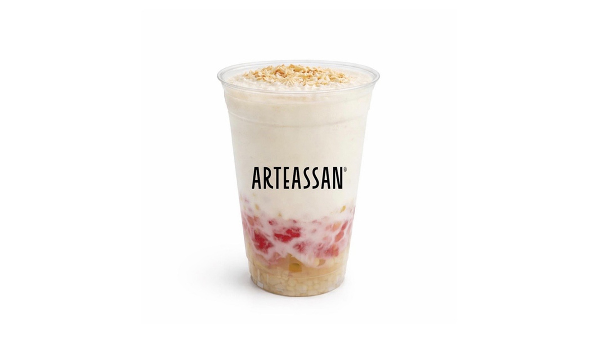 A clear plastic cup with the text "ARTEASSAN" displaying a colorful layered dessert drink, consisting of jelly and toppings at the bottom, a creamy white coconut milk layer, and a sprinkle of toasted coconut flakes on top at Tart Tart Bakery, a Cake shop in Hicksville