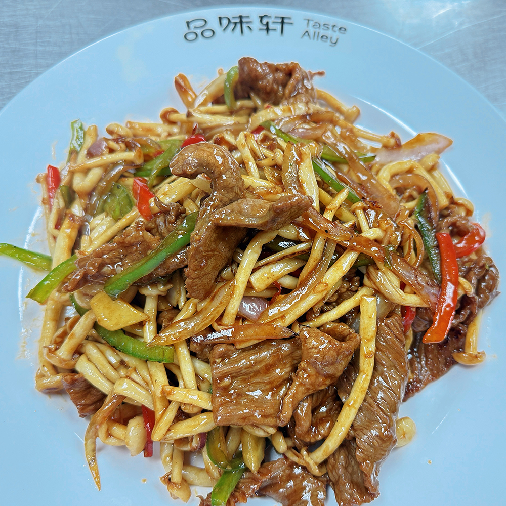 Stir-fried beef with seafood mushrooms at Taste Alley 品味轩，a Asian Restaurant in Calgary