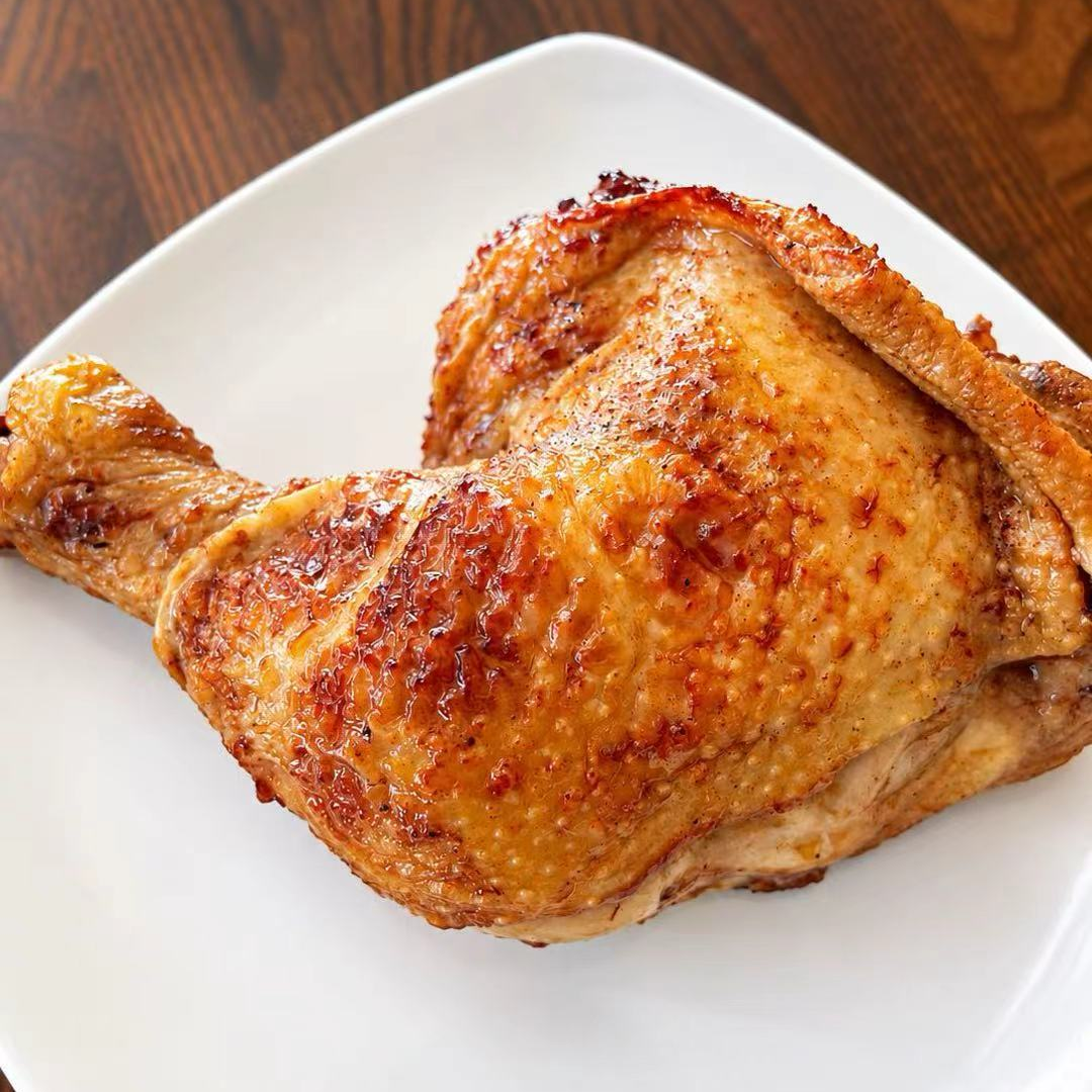 Roasted chicken leg with crispy golden skin