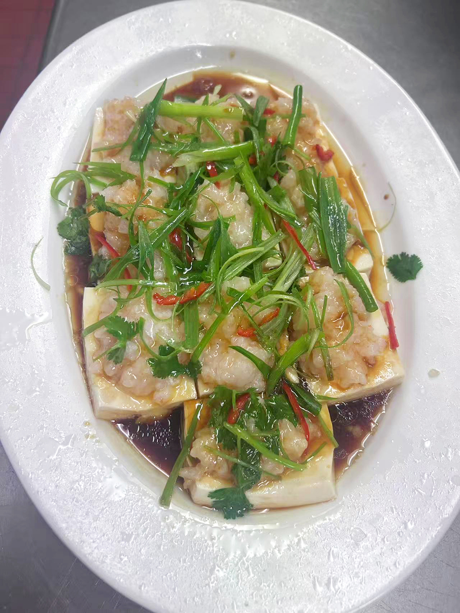 Tasty-Chinese-Cuisine-Chinese-Restaurant-Steamed-Tofu-Des-Plaines Steamed tofu dish garnished with scallions at Tasty Chinese Cuisine, a Chinese restaurant in Des Plaines