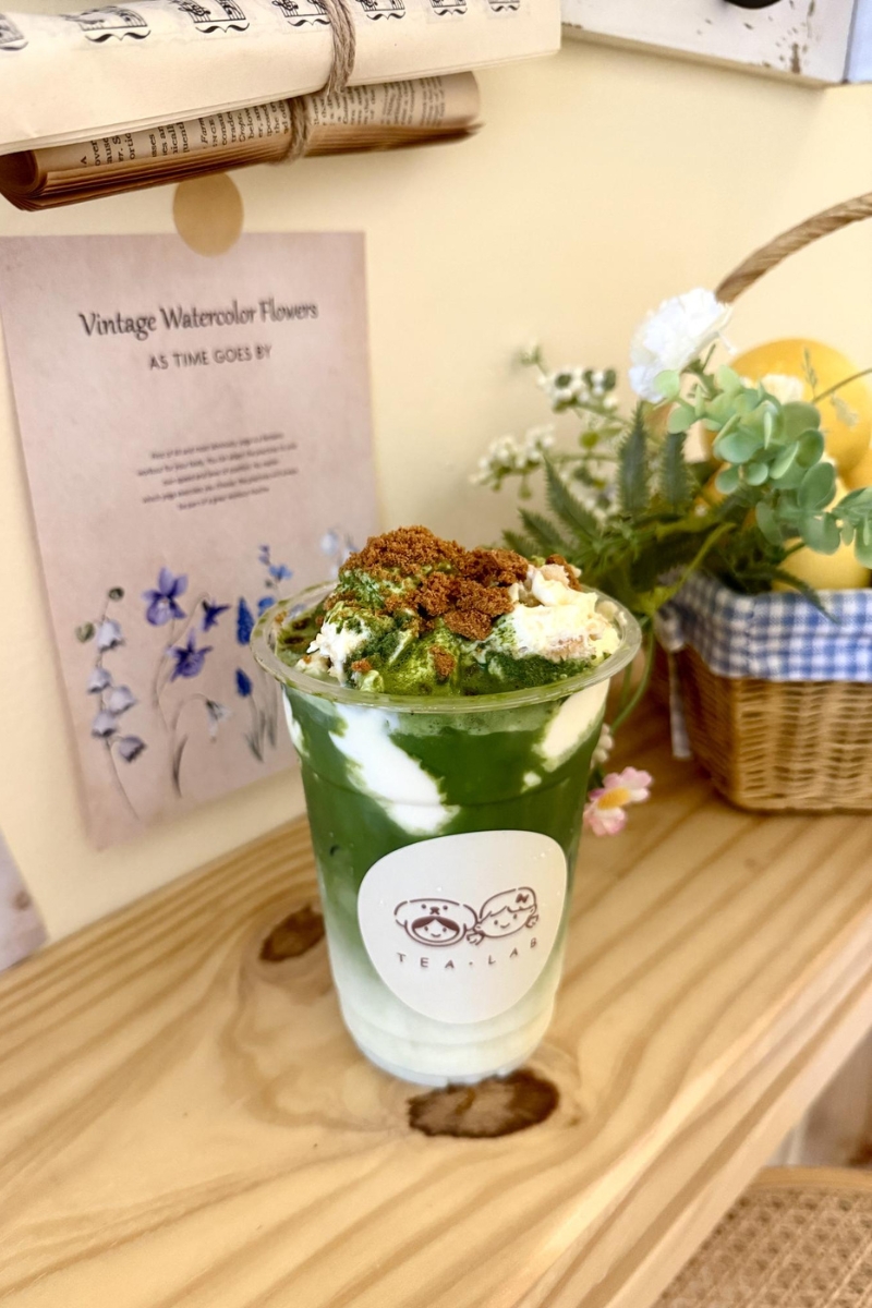 Layered matcha milk with crumble cream top at Tea.Lab, a Bubble Tea Store in FL