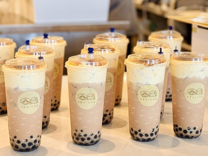 Multiple boba milk teas with thick cream top at Tea.Lab, a Bubble Tea Store in FL