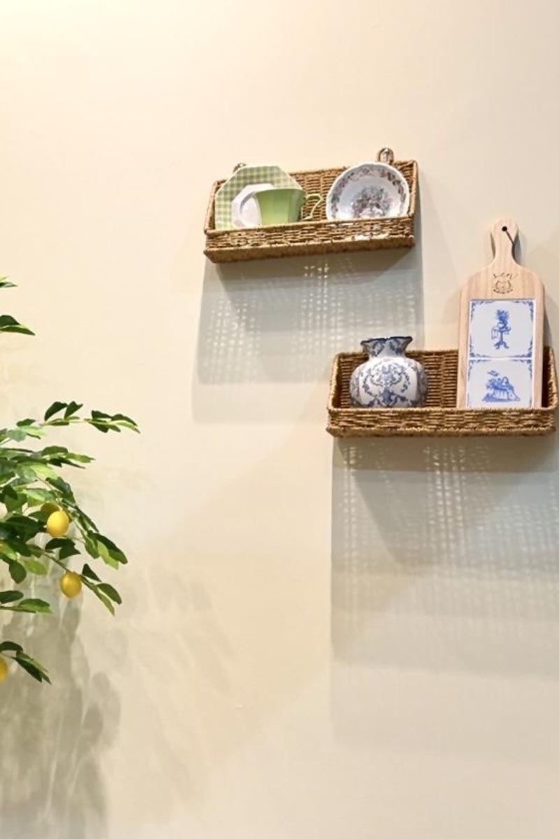 Woven wall baskets with vintage tableware decor at Tea.Lab, a Bubble Tea Store in FL
