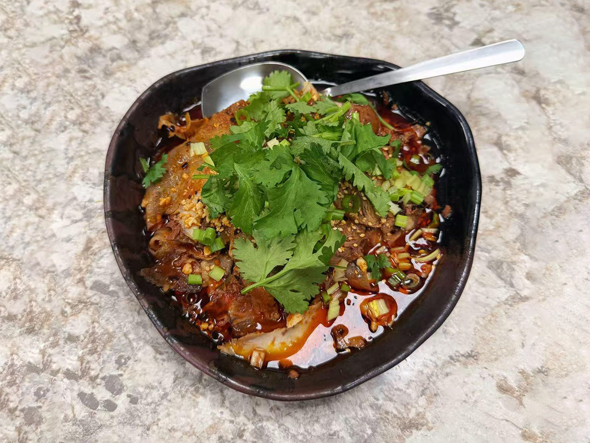 Spicy Sichuan-style sliced beef offal in chili sauce at Teng Jiao Wu 藤椒屋，a Chinese Restaurant in Flushing