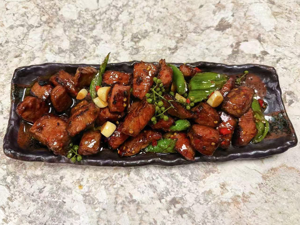 Seared beef cubes with Sichuan peppercorns and bell peppers at Teng Jiao Wu 藤椒屋，a Chinese Restaurant in Flushing