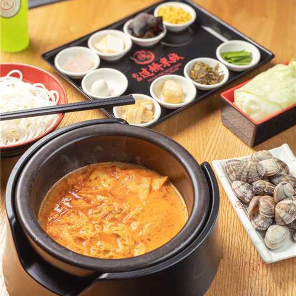 Spicy seafood hot pot with clams at Ten Seconds Rice Noodle & Ramen, a Asian Restaurant in Jacksonville