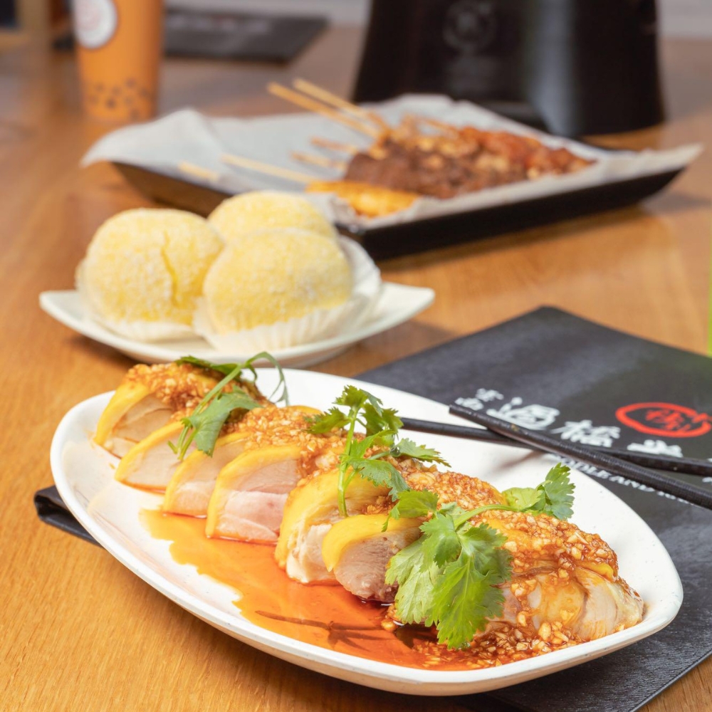 Spicy chicken, rice balls & skewers at Ten Seconds Rice Noodle & Ramen, a Asian Restaurant in Jacksonville