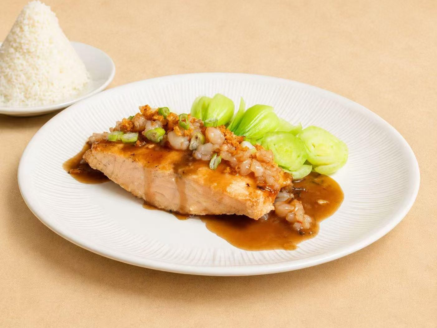 Grilled salmon with sauce and steamed rice at Thai Society, a Thai Restaurant in Westfield