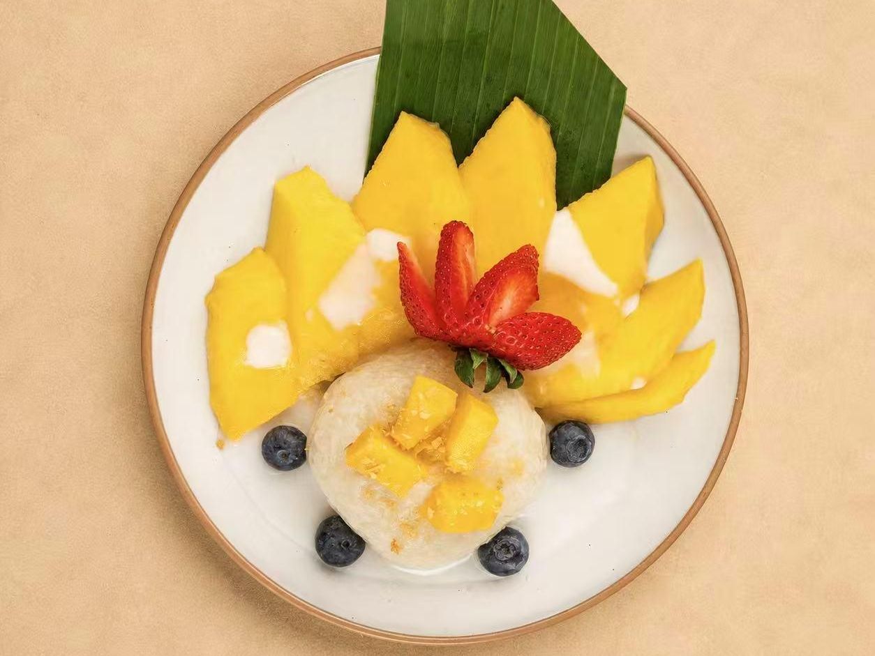 Mango sticky rice dessert with fresh fruit at Thai Society, a Thai Restaurant in Westfield