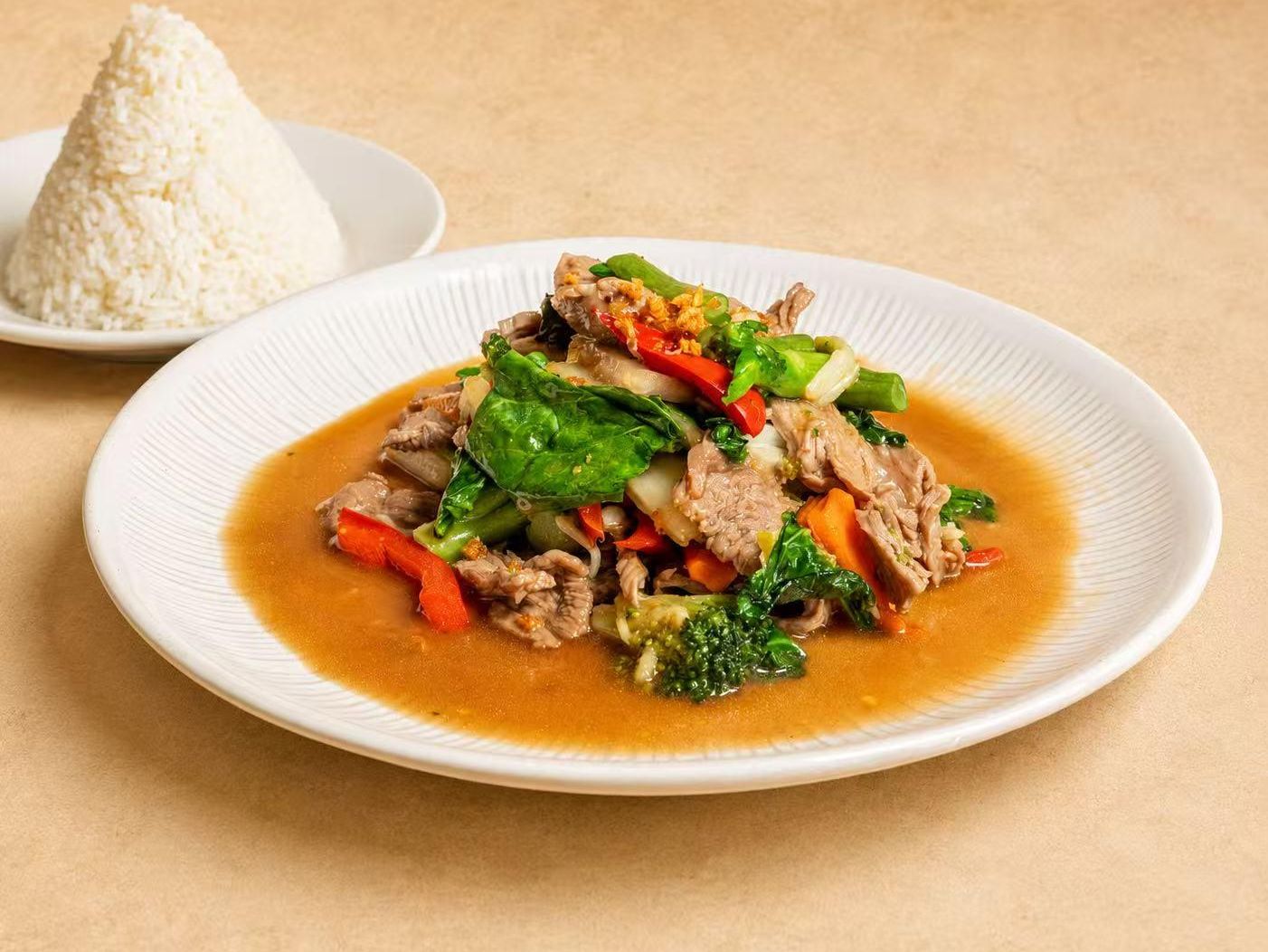 Stir-fried beef with market vegetables and rice at Thai Society, a Thai Restaurant in Westfield