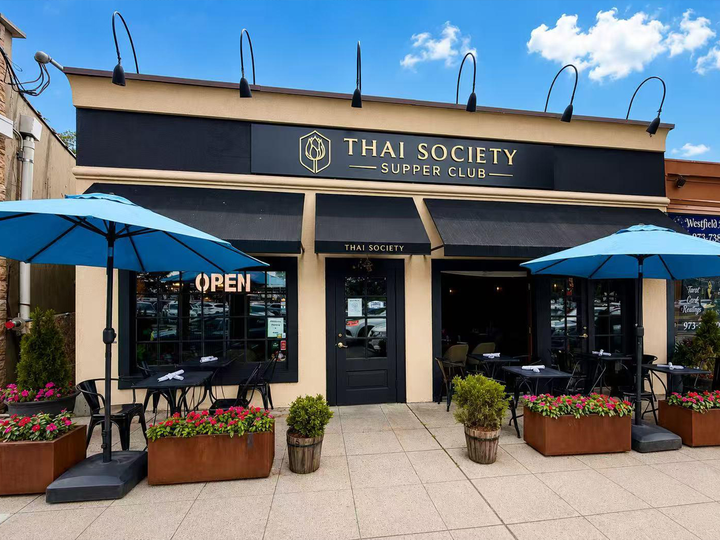 Thai Society Supper Club Storefront with Outdoor Patio Seating