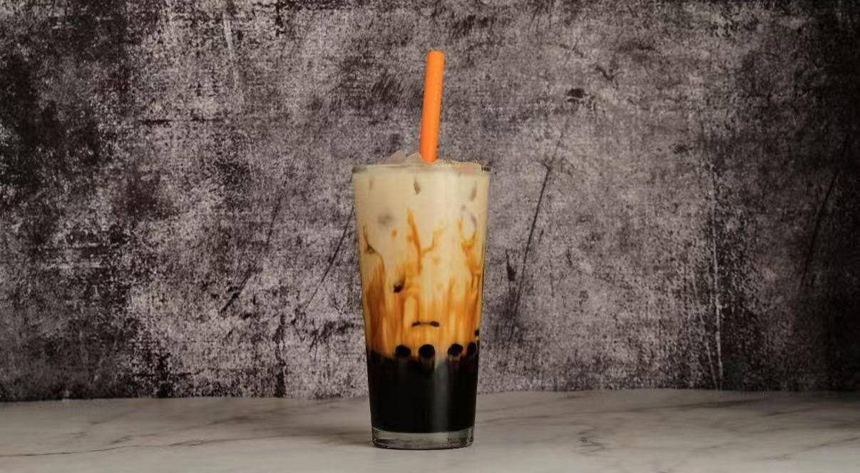 Brown Sugar Milk Tea - Iced milk tea with brown sugar tapioca pearls at The Don, a Asian Fusion Restaurant in Houston