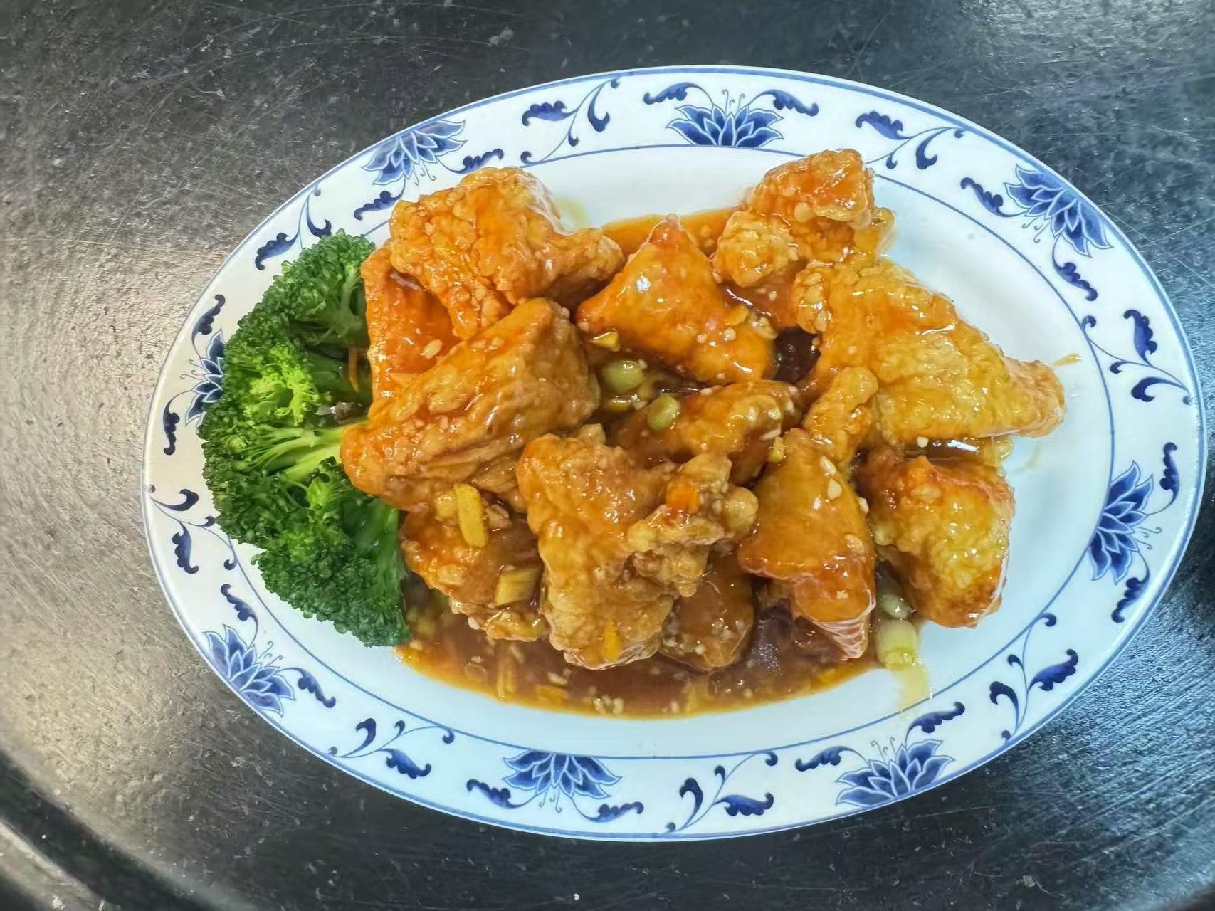 Crispy tofu in sweet - sour sauce at The Great Wall, a Chinese restaurant in Seguin