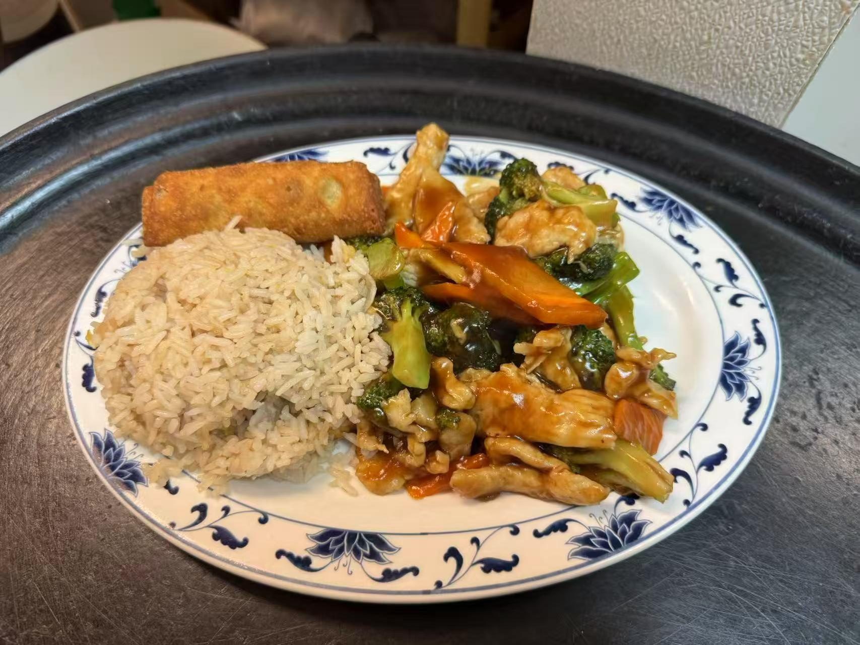 Brown rice, stir - fried chicken - veggie at The Great Wall, a Chinese restaurant in Seguin