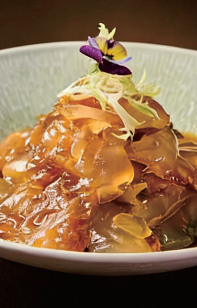 Marinated jellyfish salad with edible flower at New Shanghai No. 1, a Chinese restaurant in San Gabriel