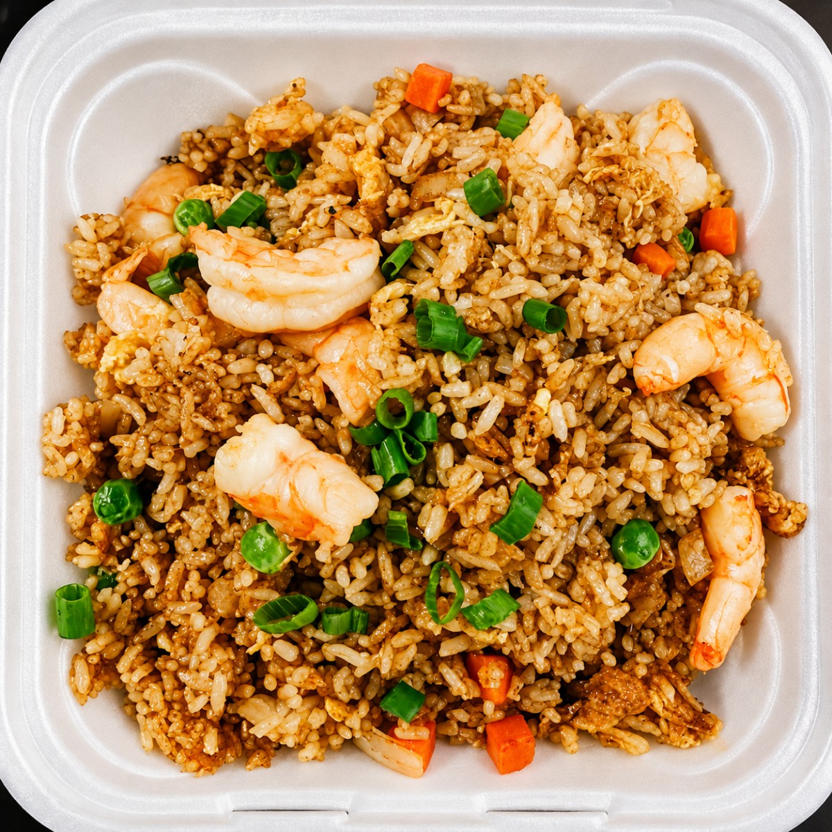 Shrimp fried rice with peas carrots and scallions at The Jade Bowl House, a Chinese Restaurant in Columbus