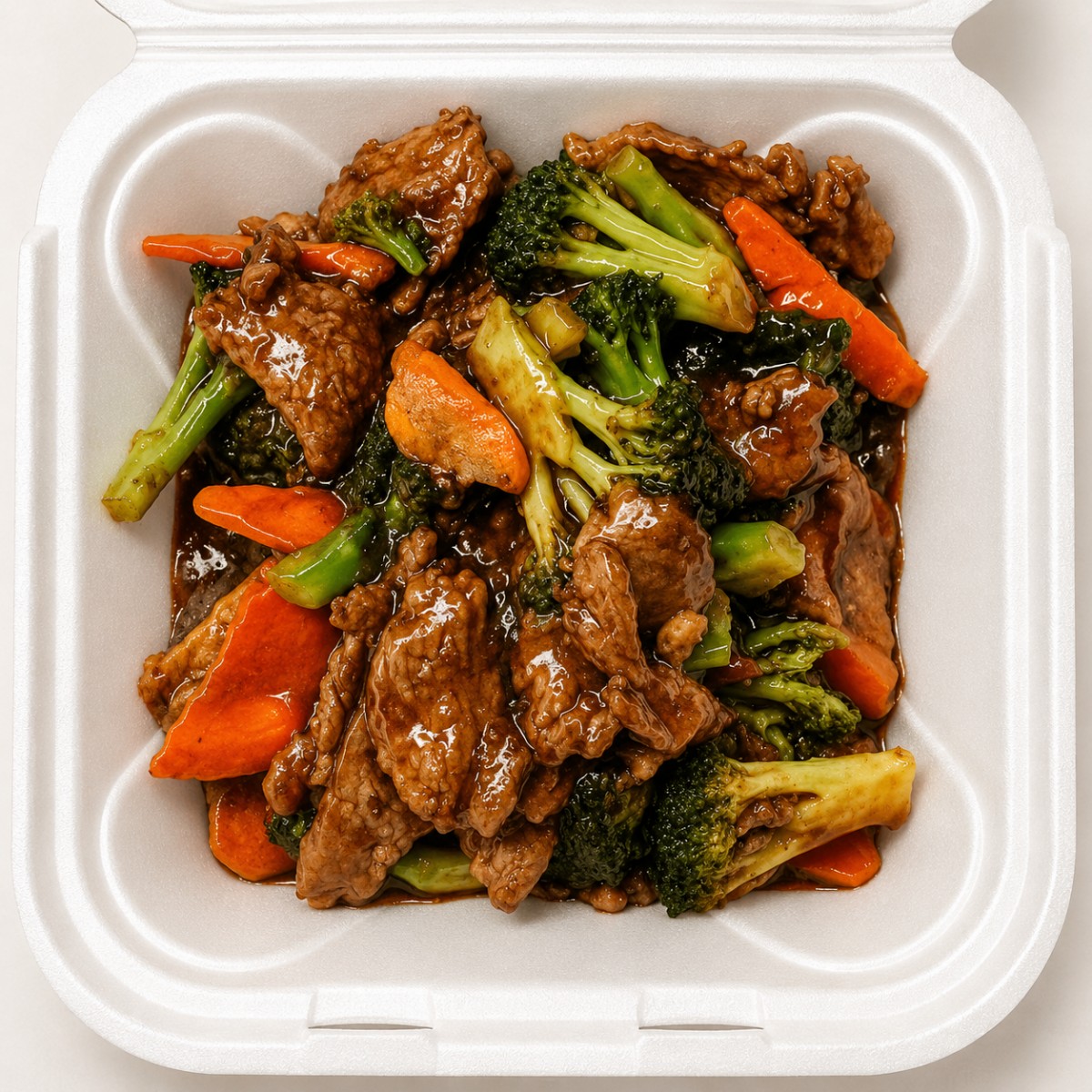 Beef with broccoli and carrots in savory sauce at The Jade Bowl House, a Chinese Restaurant in Columbus