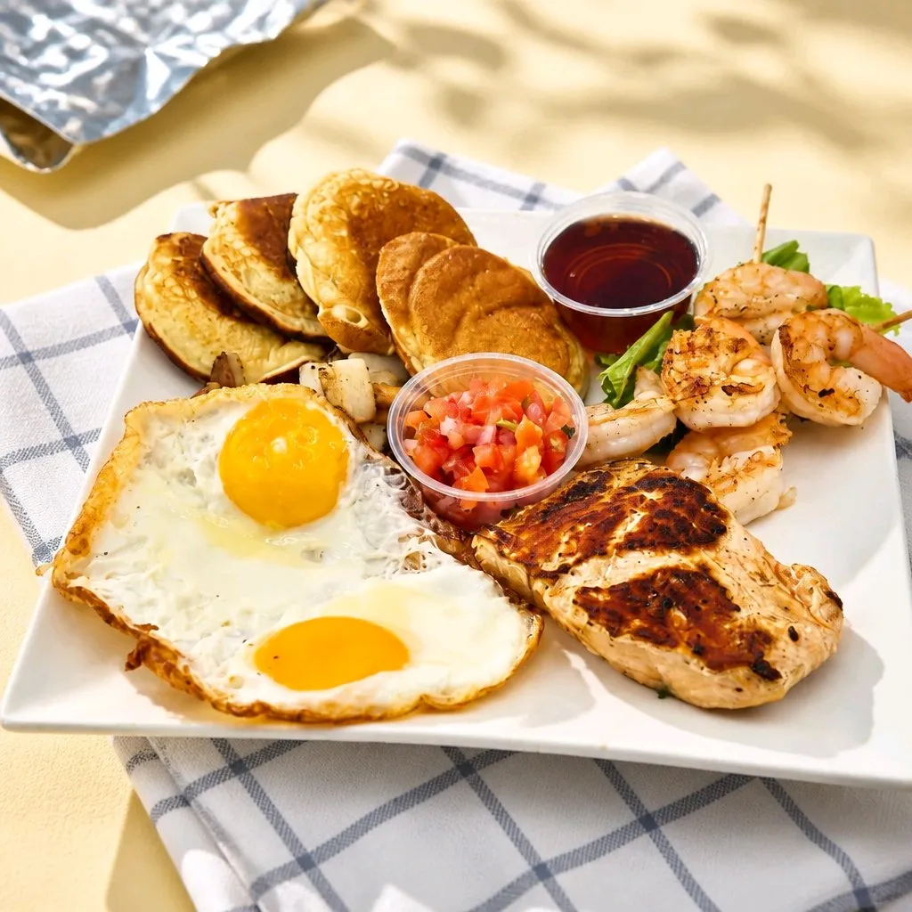 Big platter with eggs, pancakes, chicken and grilled shrimp at The Second Wind, a Breakfast Restaurant in El Segundo
