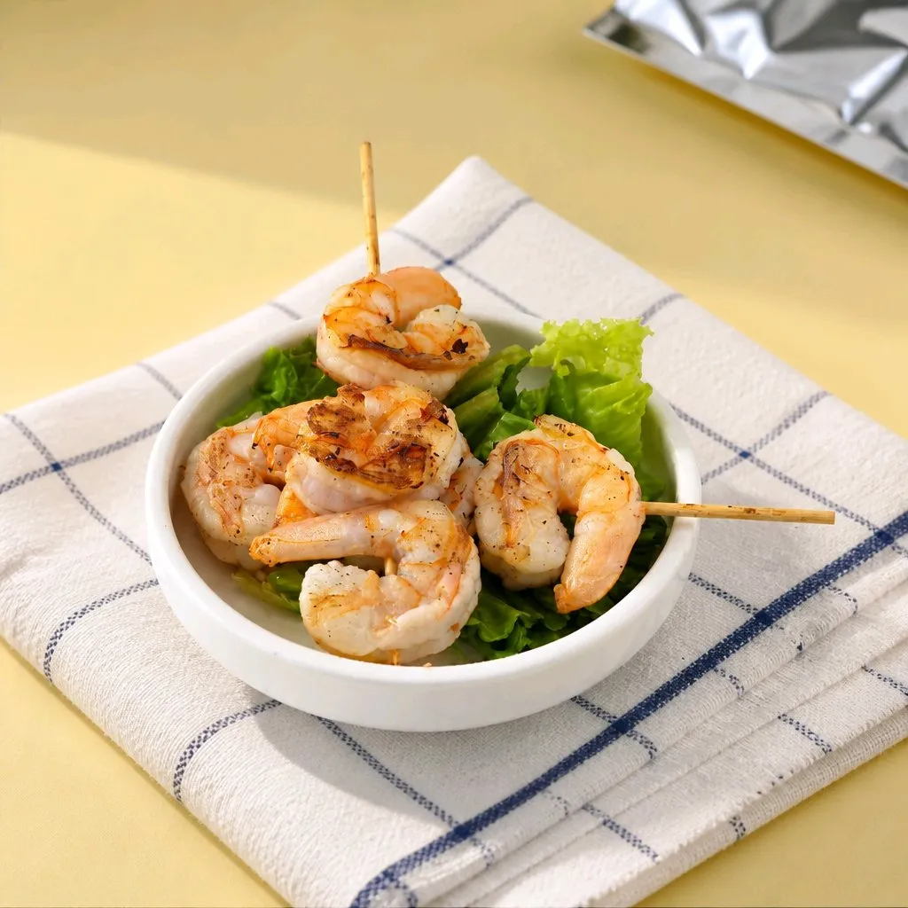 Grilled shrimp skewers served with fresh lettuce at The Second Wind, a Breakfast Restaurant in El Segundo