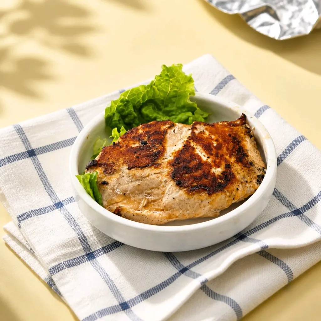 Grilled whole chicken breast with fresh lettuce at The Second Wind, a Breakfast Restaurant in El Segundo