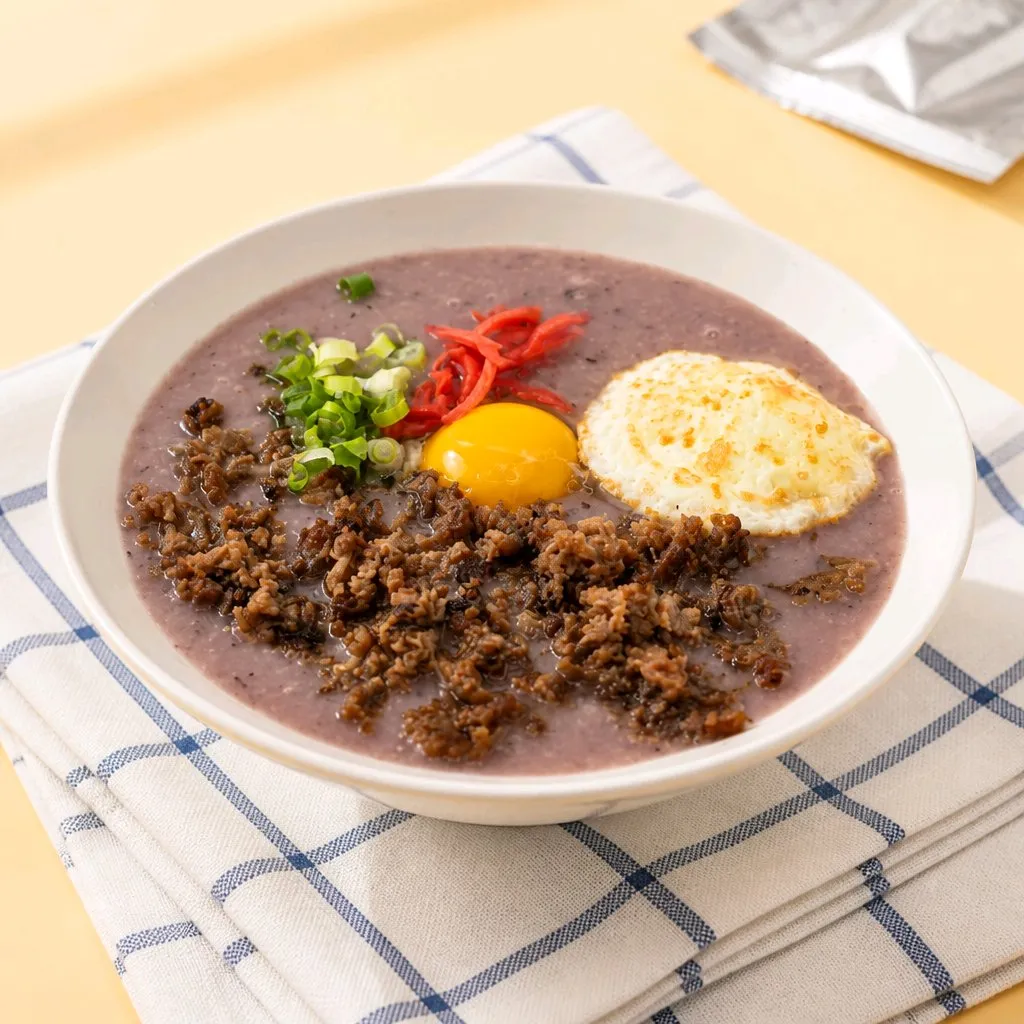 Purple rice porridge with minced beef, runny yolk & fried egg at The Second Wind, a Breakfast Restaurant in El Segundo