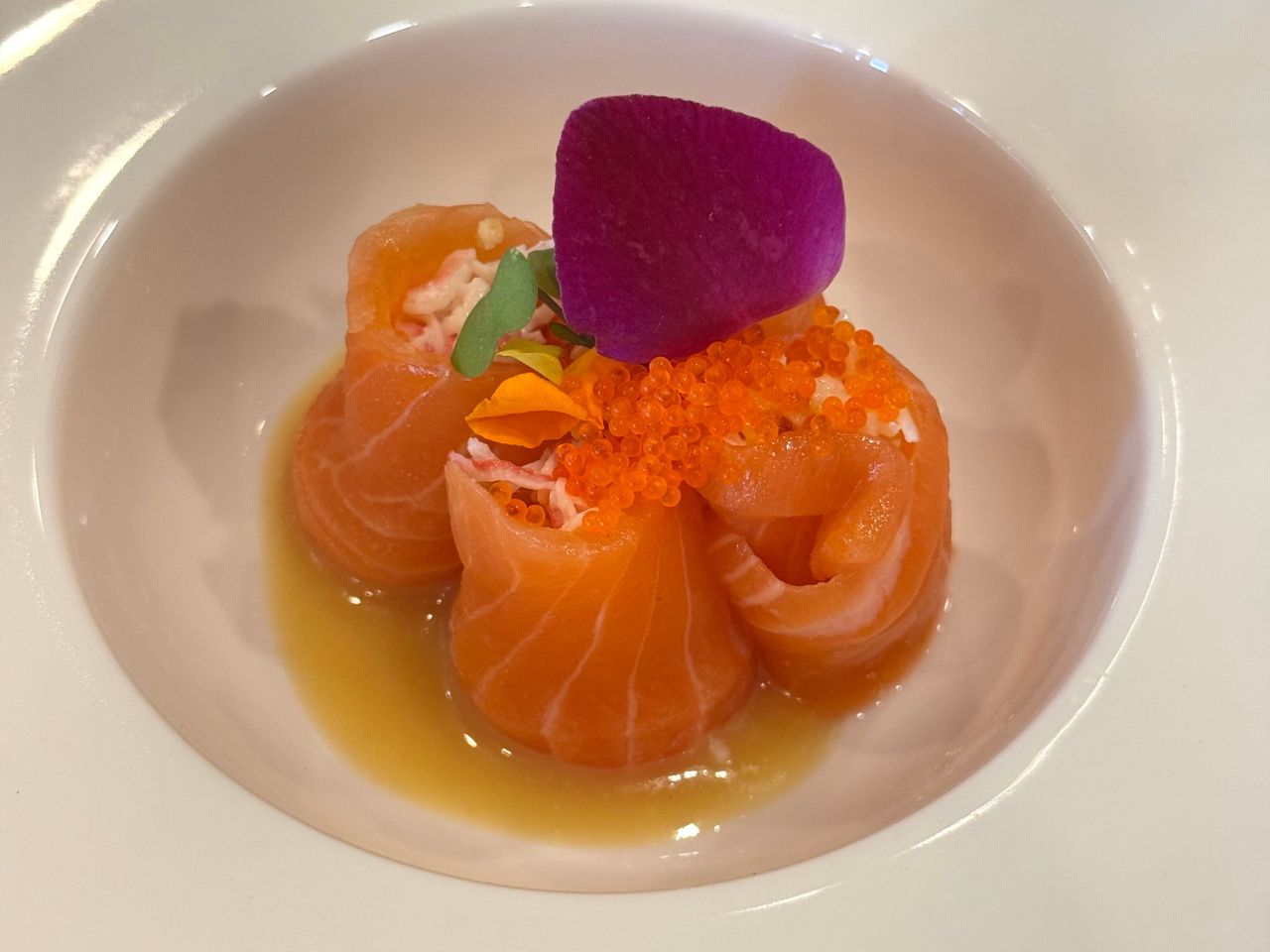 The-Shoya-Japanese-Restaurant-Salmon-Rolls-With-Roe-Pleasant-Hill Salmon rolls filled with crab, topped with roe and flower petal at The Shoya, a Japanese Restaurant in Pleasant Hill
