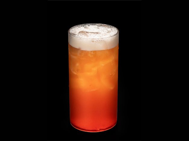 Thumbling-Chinese-Dumpling-restaurant-Orange-Sparkling-Drink-West-Covina Orange Sparkling Drink - Layered orange fizzy drink with foam at Thumbling, a Chinese Dumpling restaurant in West Covina