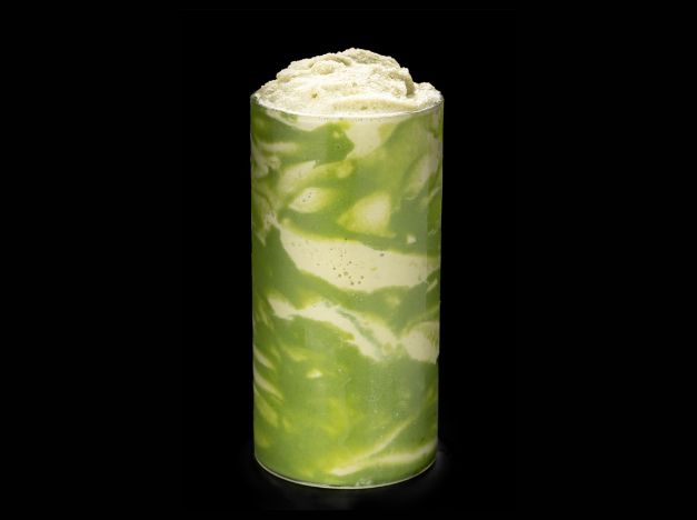 Orange Sparkling Drink – Layered orange fizzy drink with foam at Thumbling, a Chinese Dumpling restaurant in West Covina Green Tea Milkshake - Green tea - flavored milkshake with cream top at Thumbling, a Chinese Dumpling restaurant in West Covina