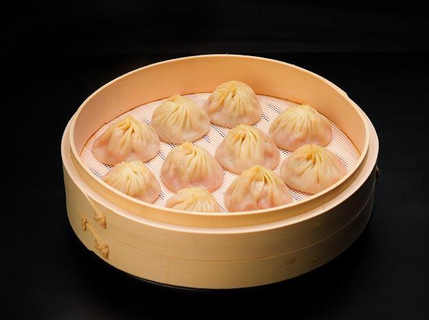 Thumbling-Chinese-Dumpling-restaurant-Steamed-Soup-Dumplings-West-Covina Steamed Soup Dumplings - Delicate steamed dumplings filled with savory soup and meat at Thumbling, a Chinese Dumpling restaurant in West Covina