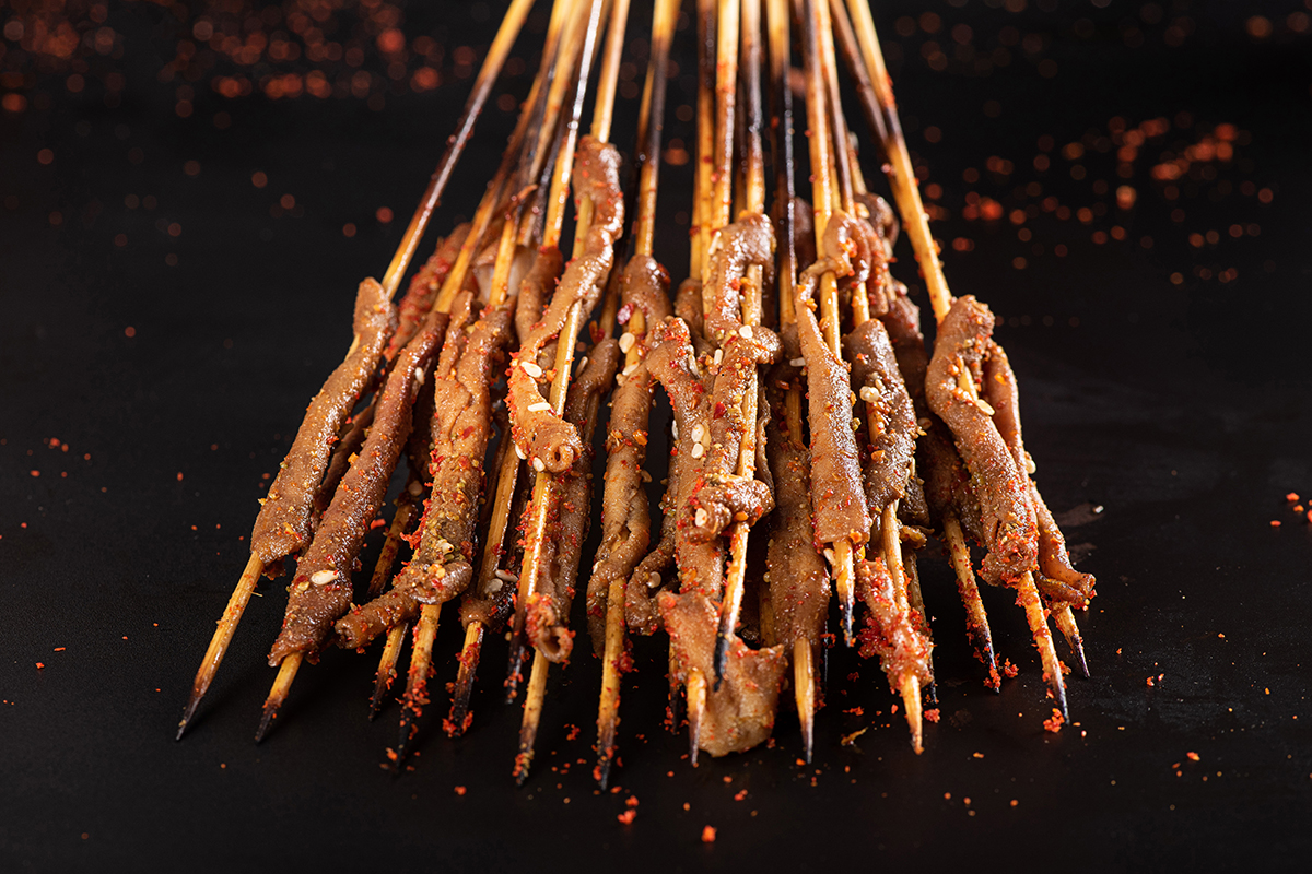 Grilled chicken intestine with spices at Tipsy Nine，a Asian Fusion Restaurant in Houston