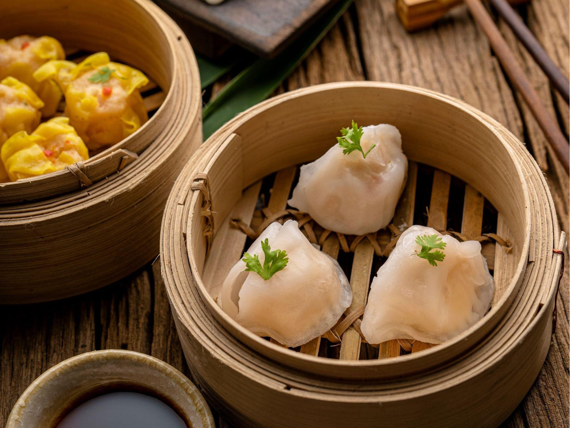 Assorted dim sum in bamboo steamers, including shrimp dumplings at Tokyo Cafe Sushi and Asian Food, a Asian Fusion Restaurant in Lubbock