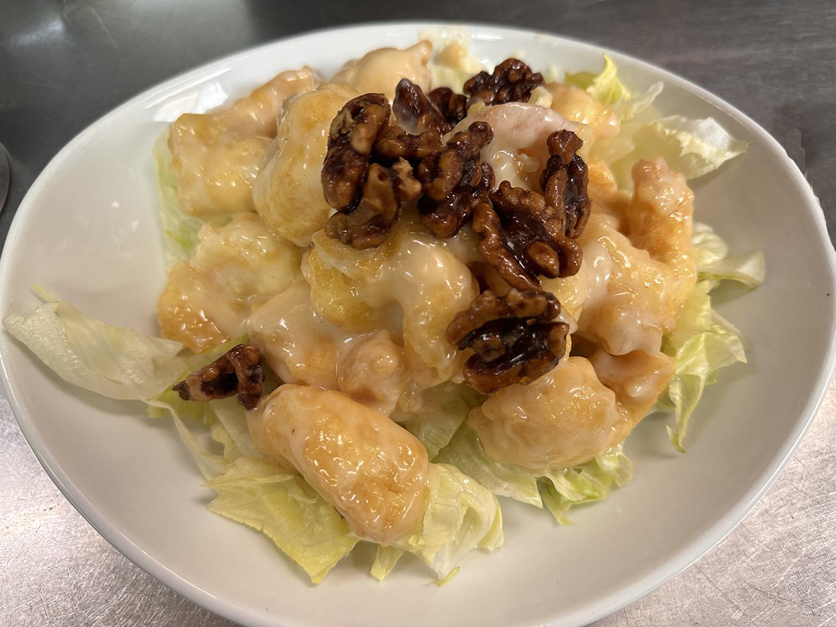 Honey walnut shrimp with creamy sauce on lettuce at Tong's Tiki Hut, an Asian Fusion Restaurant in Villa Park