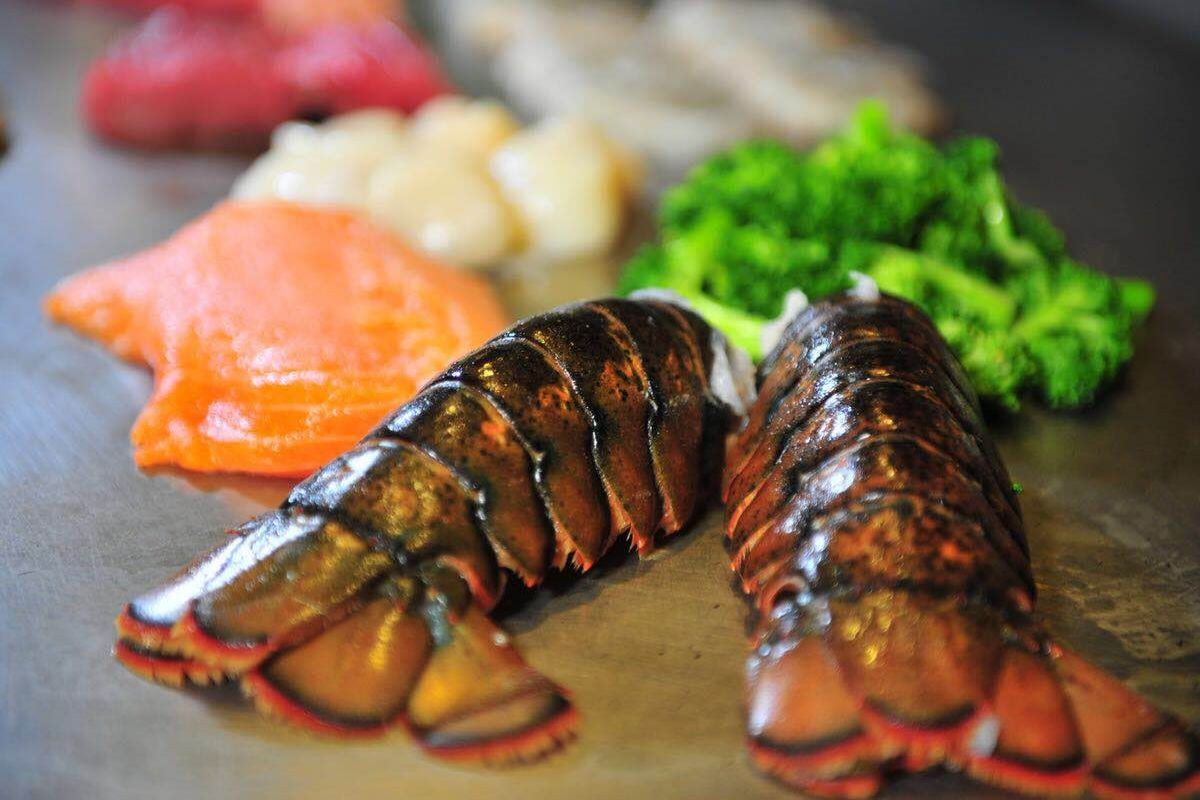 Raw lobster tails ready for teppanyaki cooking at Tony's Sushi & Steakhouse, a Japanese Restaurant in East Moriches