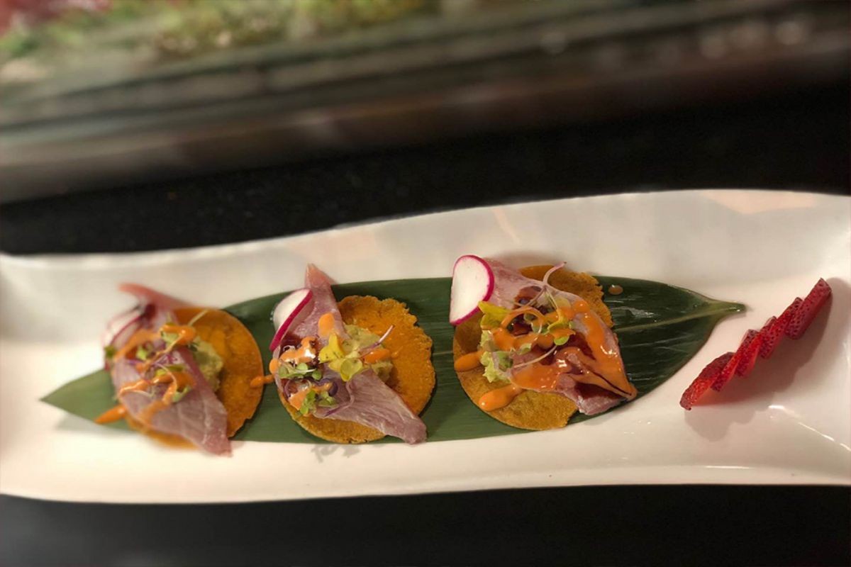 Tuna crispy tostada appetizer with garnishes at Tony's Sushi & Steakhouse, a Japanese Restaurant in East Moriches